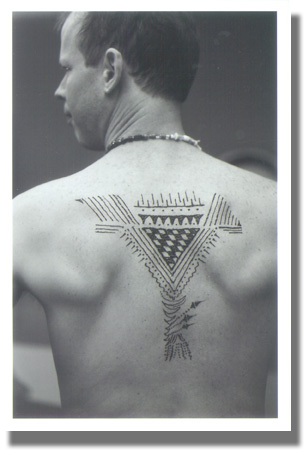 Richard's back showing Toby's henna masterpiece